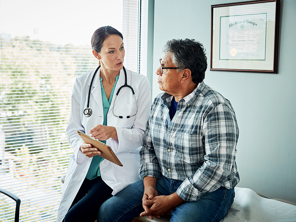 Primary Care Physician taking care of patient.